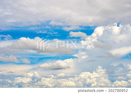 clouds and blue sunny sky, white clouds over blue sky, Aerial view, nature blue sky white cleat weather. clouds and blue sunny sky, white clouds over blue sky, Aerial view, nature blue sky white cleat weather. 102780952