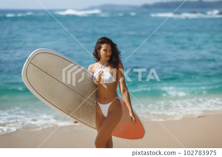 Leisurely Summer Surf Trip for Young Adult Woman Leisurely Summer Surf Trip for Young Adult Woman 102783975