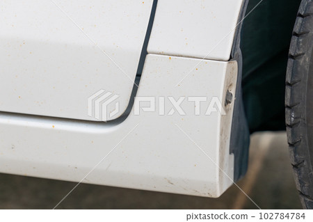 Before removing iron powder from the side of a car Before removing iron powder from the side of a car 102784784