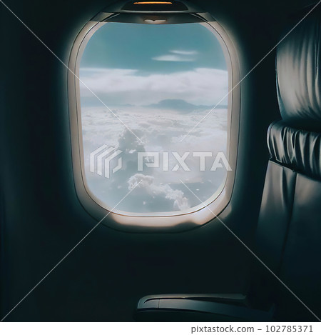 Looking out of the window of the plane, sitting in the cabin,night sky  102785371