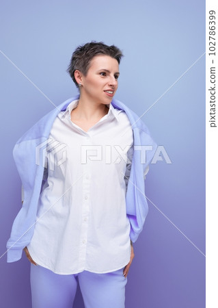 portrait of self-sufficient charismatic young millennial woman with short haircut 102786399