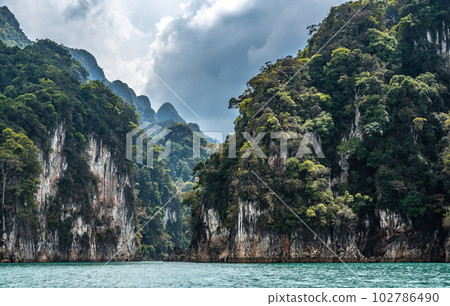 Amazed nature scenic landscape with boat for traveler, Attraction famous landmark tourist travel Khao Sok National Park, Thailand 102786490