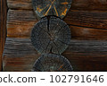 Log well assembly of beams orlogs. Corner of a hut or log building 102791646