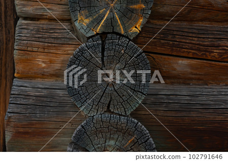 Log well assembly of beams orlogs. Corner of a hut or log building Log well assembly of beams orlogs. Corner of a hut or log building 102791646