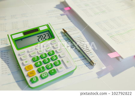 tax time. calculator and documents on desk tax time. calculator and documents on desk 102792822
