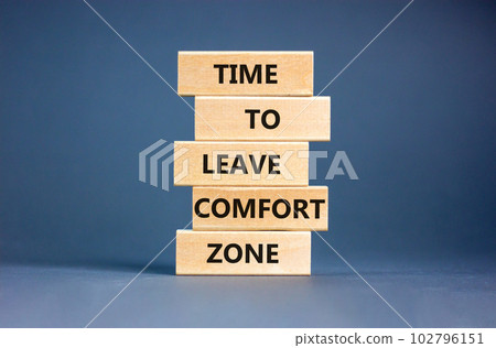 Leave comfort zone symbol. Concept words Time to leave comfort zone on wooden blocks. Beautiful grey table grey background. Business time to leave comfort zone concept. Copy space. Leave comfort zone symbol. Concept words Time to leave comfort zone on wooden blocks. Beautiful grey table grey background. Business time to leave comfort zone concept. Copy space. 102796151