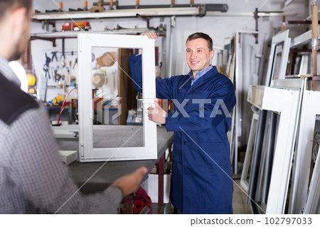 Professional labour demonstrating PVC profiles Professional labour demonstrating PVC profiles 102797033