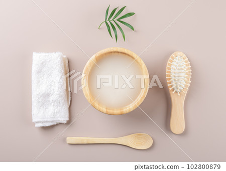 Homemade cosmetic rice water with ingredients on beige background Homemade cosmetic rice water with ingredients on beige background 102800879
