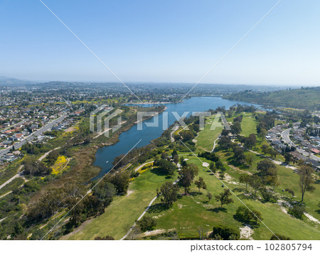 Aerial view of house around Lake Murray reservoir in San Diego, California 102805794