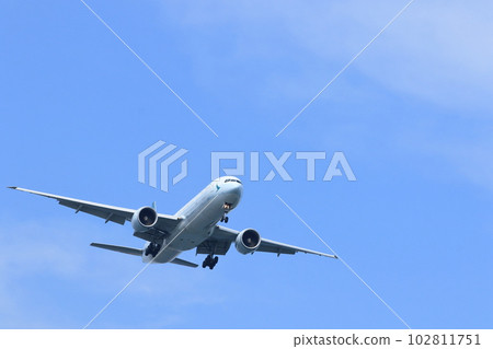 Air travel Passenger plane rising into the blue sky Air travel Passenger plane rising into the blue sky 102811751