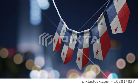 A garland of Panama national flags on an abstract blurred background A garland of Panama national flags on an abstract blurred background 102814827