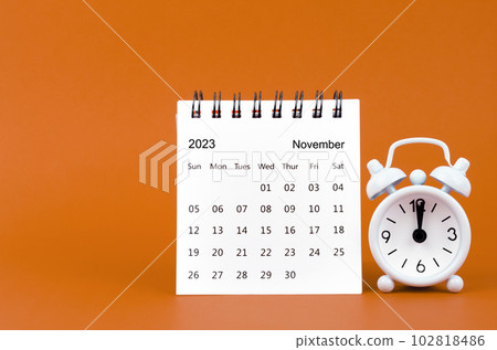 The November 2023 Monthly desk calendar for 2023 year and alarm clock The November 2023 Monthly desk calendar for 2023 year and alarm clock 102818486