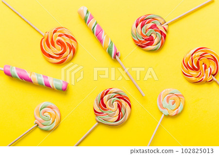 Set of colorful lollipops on colored background. Summer concept. Party Happy Birthday or Minimalist Concept 102825013