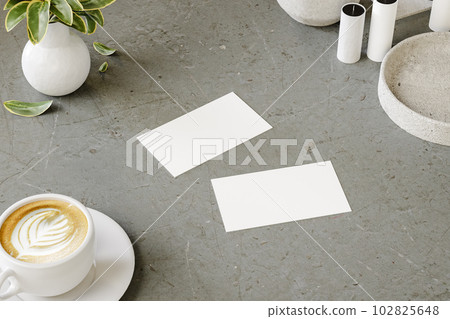 Photo of two business cards on office desk. Template for branding. 3d render 102825648