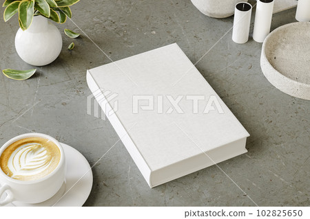 Hard cover book mock up on modern desk for presentation and advertising. 3D rendering Hard cover book mock up on modern desk for presentation and advertising. 3D rendering 102825650