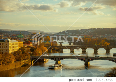 landscape with Vltava river, Karlov most and boat 102825890