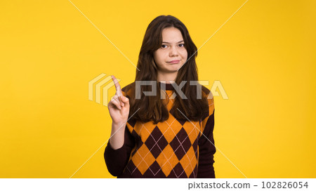 Young woman showing sign of refusal 102826054