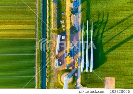 Construction and installation of a wind turbine. Production of clean green energy. Construction and installation of a wind turbine. Production of clean green energy. 102828066