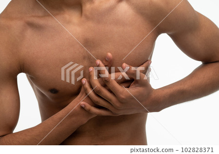 Young dark-skinned guy suffering from heartache 102828371