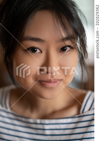 Close up of a cute asian young girl 102829362