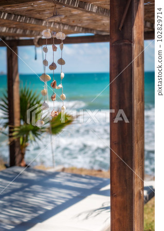 Nautical style hanging seashells decoration Nautical style hanging seashells decoration 102829714