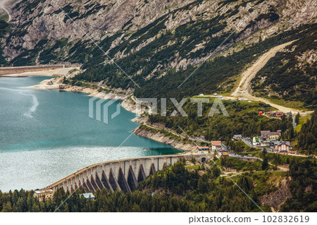 landscape with mountains, Fedaia lake and trees landscape with mountains, Fedaia lake and trees 102832619