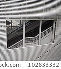 A white staircase near the station that looks like a cartoon frame 102833332
