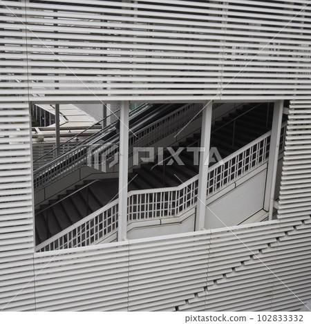 A white staircase near the station that looks like a cartoon frame 102833332
