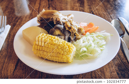 Close up of traditional Maori food (they called 'Kai'), usually cooked under the ground in ovens called hangi. In thermal areas. Maori also used natural pools of boiling warer and steam. 102834777