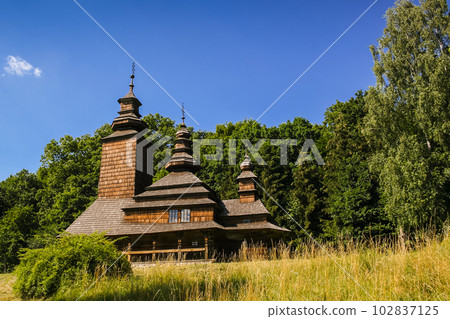 Old wooden church in the village 102837125