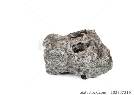 macro mineral stone schorl, black tourmaline on white background macro mineral stone schorl, black tourmaline on white background 102837219
