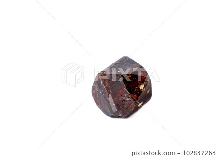 Macro Zircon mineral stone on a white background Macro Zircon mineral stone on a white background 102837263