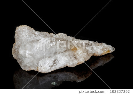 Macro mineral quartz snow stone on a black background 102837292
