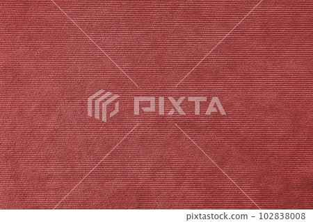 Red velveteen upholstery fabric texture background. Red velveteen upholstery fabric texture background. 102838008