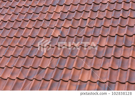 Red tiles roof background Red tiles roof background 102838128