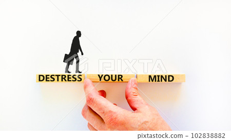 Destress your mind symbol. Concept words Destress your mind on wooden blocks. Doctor hand. Beautiful white table white background. Psychological business and destress your mind concept. Copy space. Destress your mind symbol. Concept words Destress your mind on wooden blocks. Doctor hand. Beautiful white table white background. Psychological business and destress your mind concept. Copy space. 102838882