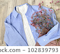 Spring/summer fashion blue shirt and pink denim pants coordination 102839793