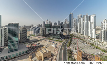 Panorama showing Bay Avenue with modern towers residential development in Business Bay aerial timelapse, Dubai Panorama showing Bay Avenue with modern towers residential development in Business Bay aerial timelapse, Dubai 102839926