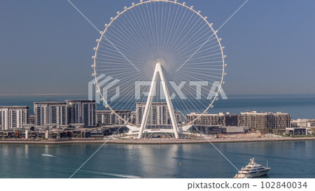 Bluewaters island with modern architecture and ferris wheel aerial timelapse. Bluewaters island with modern architecture and ferris wheel aerial timelapse. 102840034