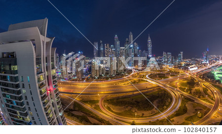 Dubai Marina highway intersection spaghetti junction day to night timelapse Dubai Marina highway intersection spaghetti junction day to night timelapse 102840157
