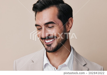 man beige handsome happy background successful smiling businessman portrait suit copyspace business 102841022
