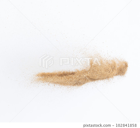 Sand flying explosion, Golden sand wave explode. Abstract sands cloud fly. Yellow colored sand splash throwing in Air. White background Isolated high speed shutter, throwing freeze stop motion 102841858