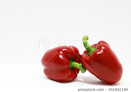 bright red paprika on white background 102842199