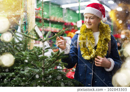 Portrait of girl at christmas street fair evening Portrait of girl at christmas street fair evening 102843303