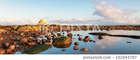 Rocky Shore on the Ocean Coast. Canadian Nature Background. Rocky Shore on the Ocean Coast. Canadian Nature Background. 102843787