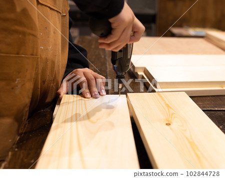 Children making DIY furniture 102844728