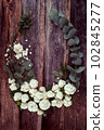 rustic style floral composition with white spring flowers 102845277