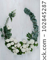rustic style floral composition with white spring flowers 102845287