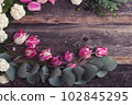 rustic style floral composition with white spring flowers 102845295