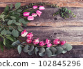 rustic style floral composition with white spring flowers 102845296